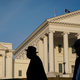People walking in front of the Virginia State Capitol in February 2019.